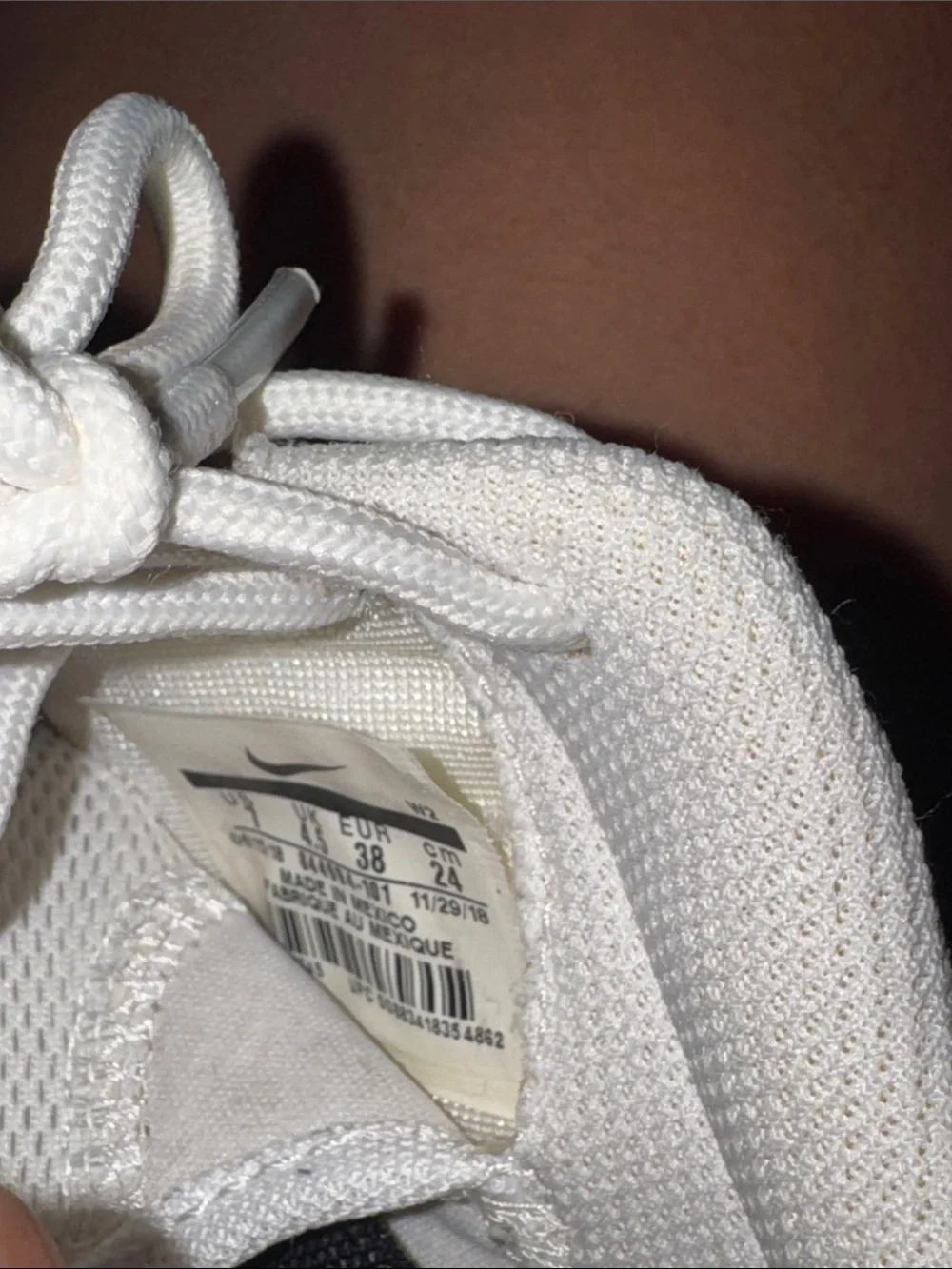 Nike Women’s White Mesh Sneakers with Black Swoosh